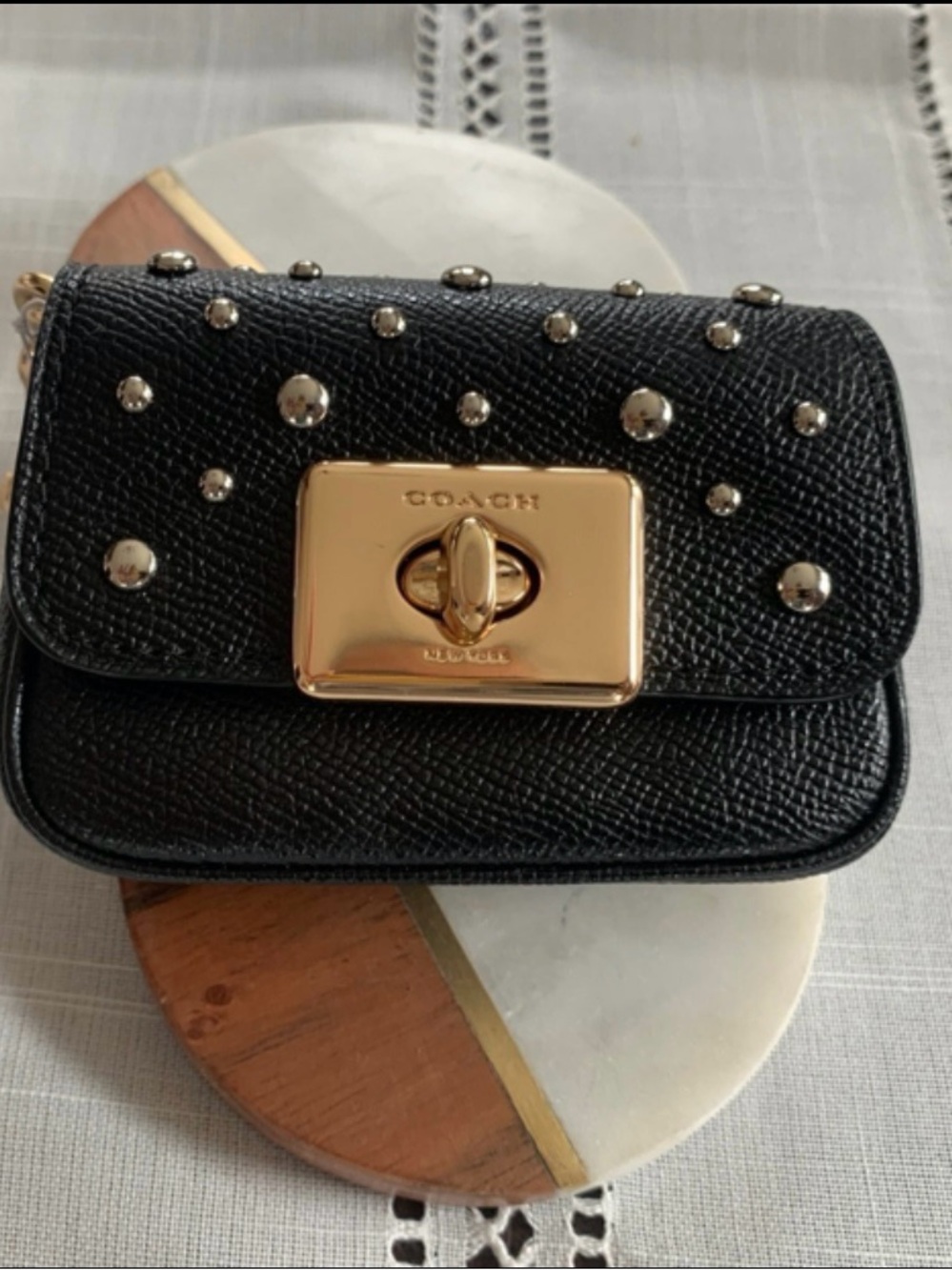 Coach Black Mini Turnlock Bag Charm with Gold Hardware and Silver Studs
